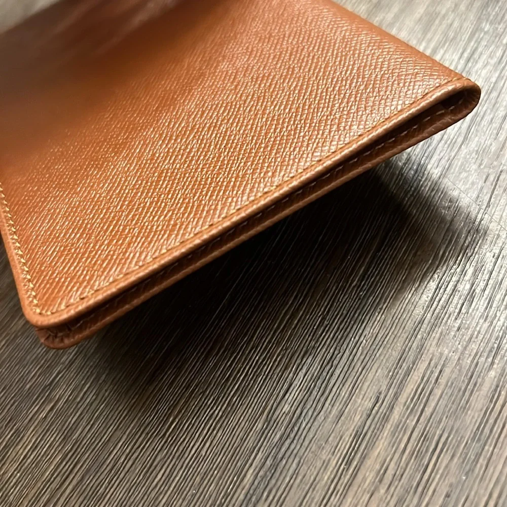 Authentic Louis Vuitton brown taiga leather bifold card I.D. Holder